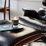 Malin + Goetz Glassed Dark Rum Candle In living room