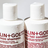 Malin + Goetz 236ml Peppermint Shampoo  beside the cilantro conditioner
