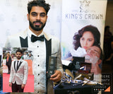 Celebrity posing with a Kings Crown Ultra rich Shave Cream in a Blue Box