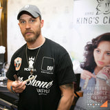 om Hardy posing with a King’s Crown Carbon Steel STRAIGHT RAZOR blade- Buffalo Horn handle