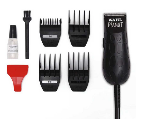Whal Peanut Trimmer black color 4 attachment combs, oil, cleaning brush, and red blade guard out of package 